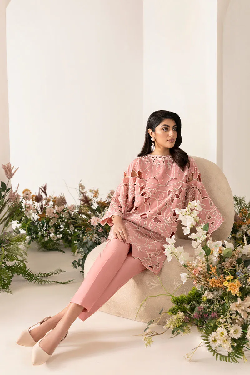 Close-Up of Off White Thread Embroidery on Baby Pink Shirt