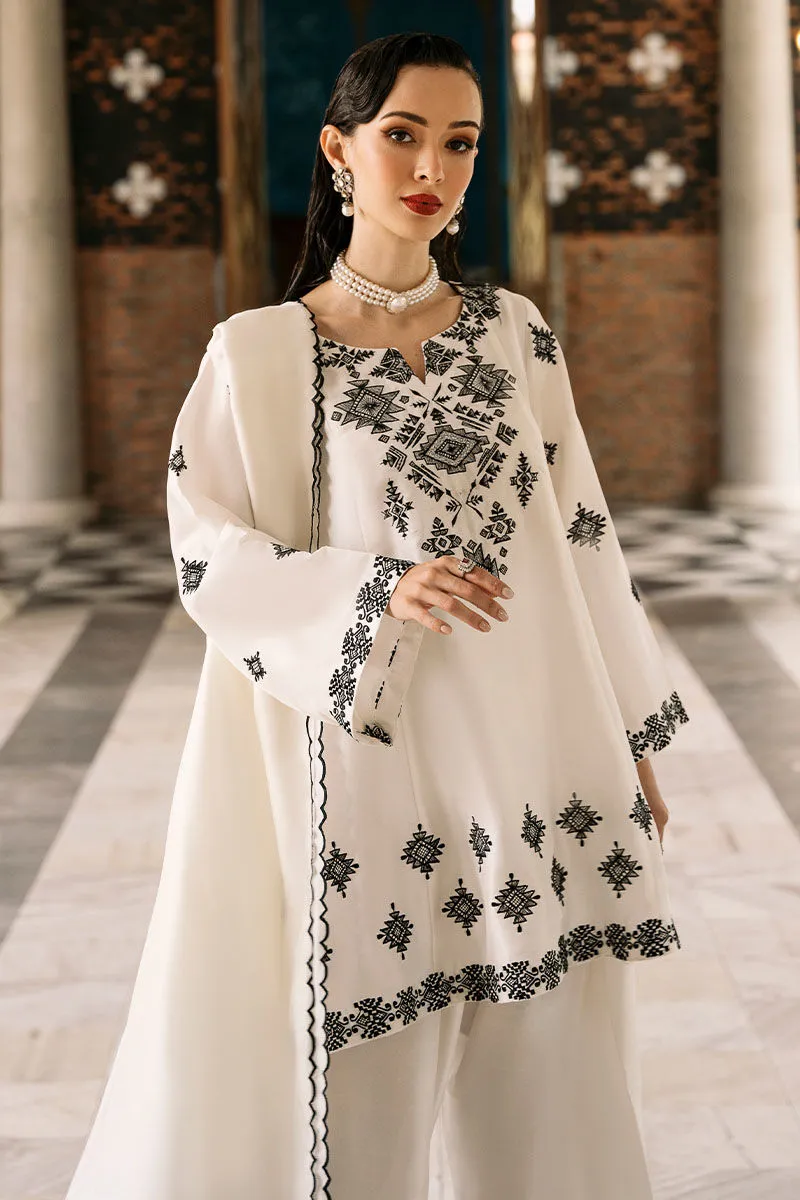 White Embroidered Set with Tribal Motifs – Elegant Raw Silk Look