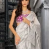 The Silver Embellished Saree in motion, showing the beautiful fluid drape of the shamose silk fabric.