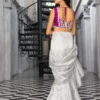 The Silver Embellished Saree in motion, showing the beautiful fluid drape of the shamose silk fabric.