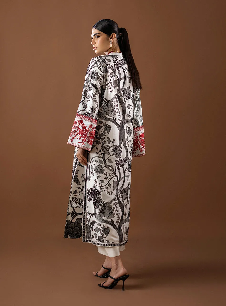 The Kantha Work Shirt styled, showing the fluid movement and elegant drape of the viscose silk fabric. The Kantha Work Shirt styled, showing the fluid movement and elegant drape of the viscose silk fabric.