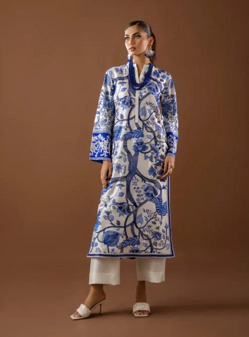 The Kantha Work Shirt styled, showing the luxurious, fluid drape of the viscose silk fabric. The Kantha Work Shirt styled, showing the luxurious, fluid drape of the viscose silk fabric.