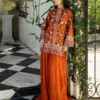 The full silhouette of the orange embroidered shirt paired with the flowing 47-inch chiffon crushed plazo pants.