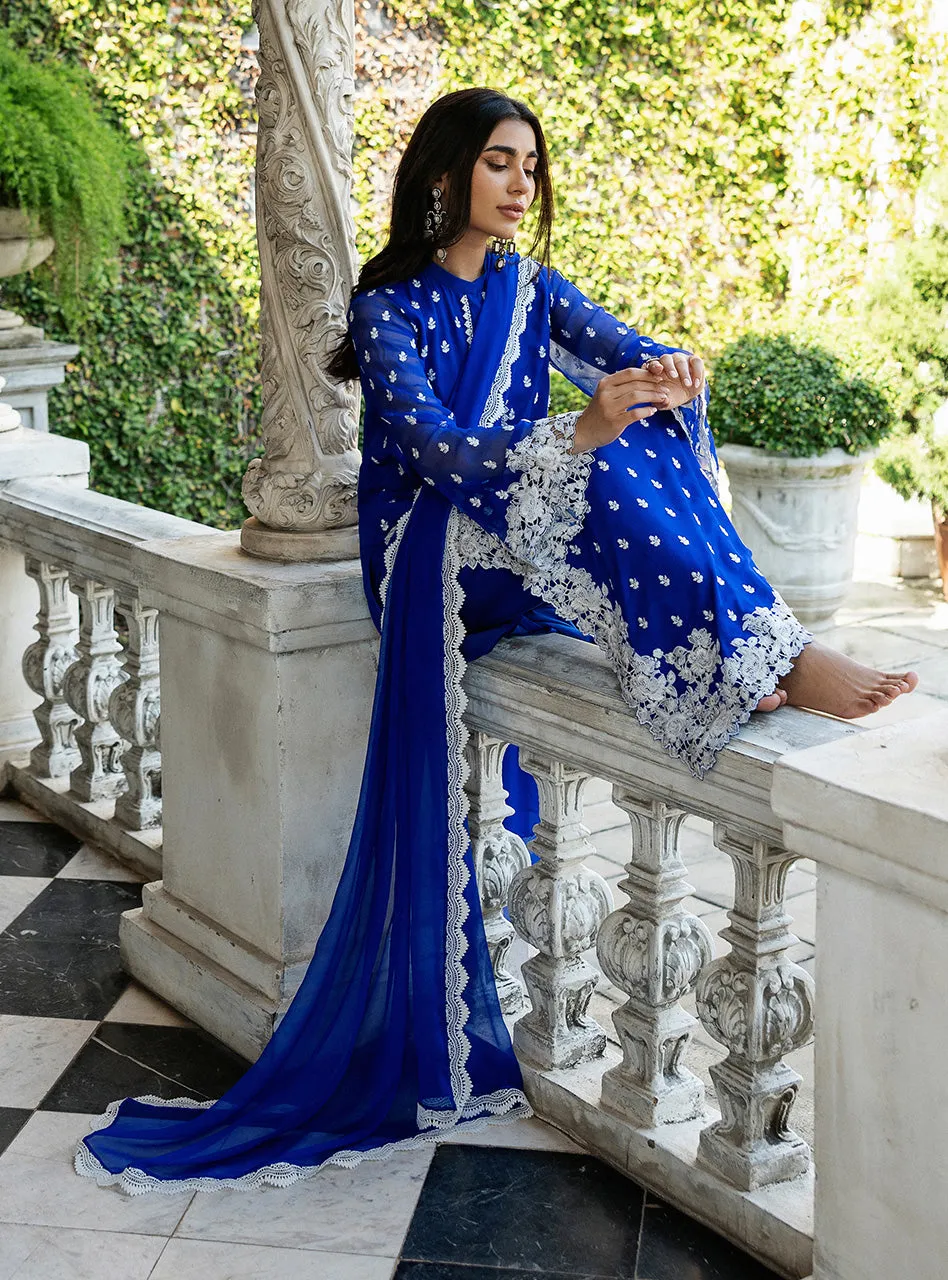Detail shot of the lace-finished border on the pure chiffon dupatta of the Cobalt Blue Embroidered Suit.