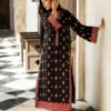 Full view of the Black Orchid Kashmiri Suit with its raw silk pants and the pure chiffon dupatta with a Jamawar border.