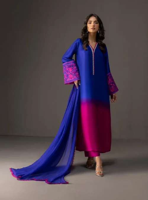 Gradient embroidered suit showing the deep blue to vibrant pink transition on luxurious tussle silk. Gradient embroidered suit showing the deep blue to vibrant pink transition on luxurious tussle silk.
