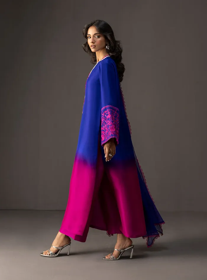 Detail shot of the delicately embellished V-neckline on the gradient embroidered suit.