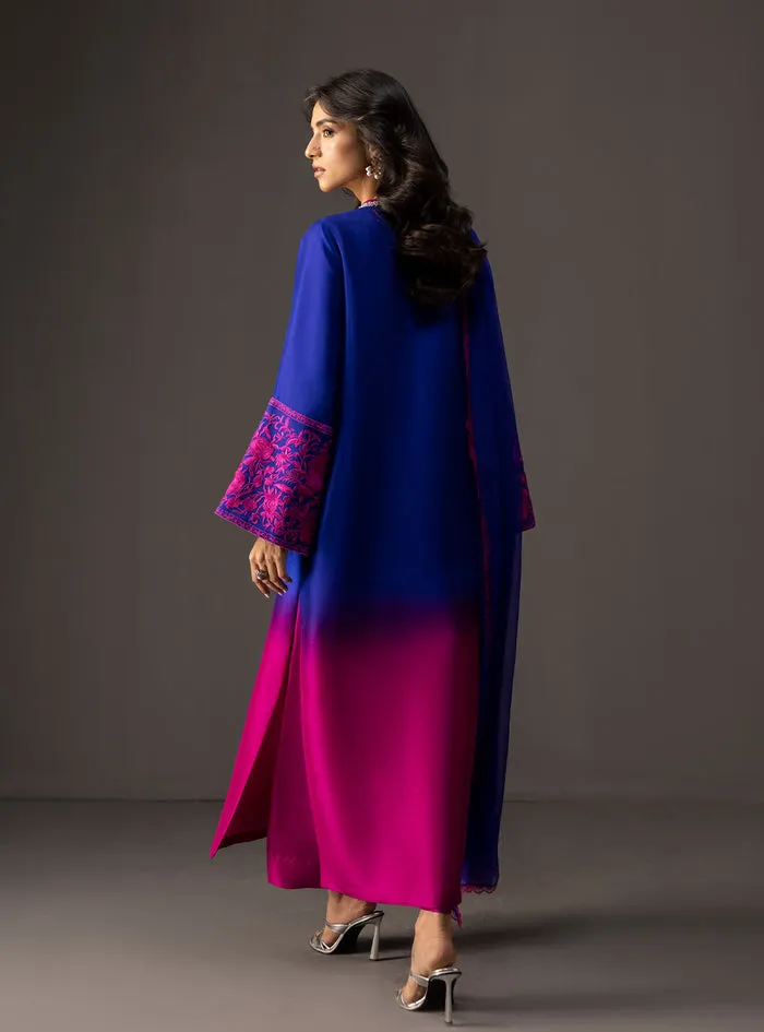 Gradient embroidered suit showing the deep blue to vibrant pink transition on luxurious tussle silk.