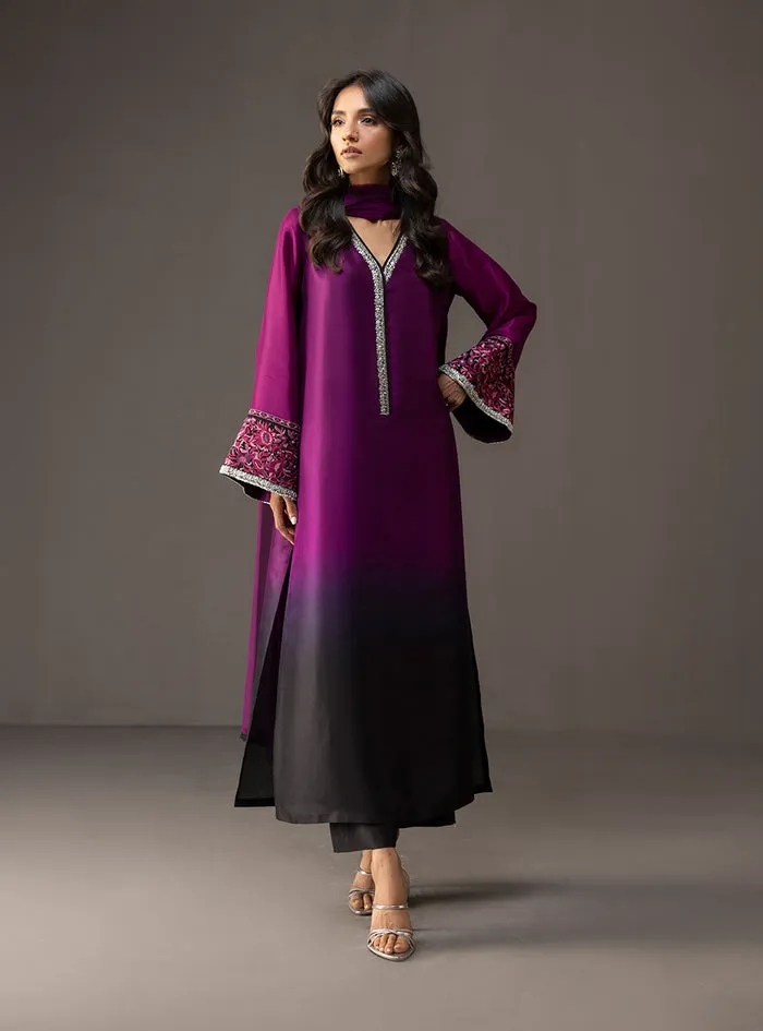 Full look of the Gradient Embellished Suit with matching tussle silk pants and a flowing black pure chiffon dupatta.