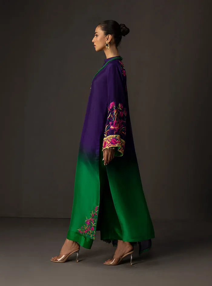 Gradient embroidered suit showcasing the majestic deep amethyst to lush emerald ombre on a flowing tussle silk shirt.