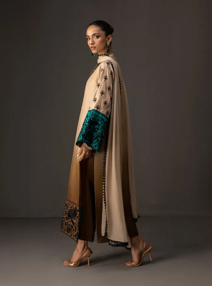 Gradient embroidered shirt showcasing the elegant beige to taupe ombre on flowing tussle silk.