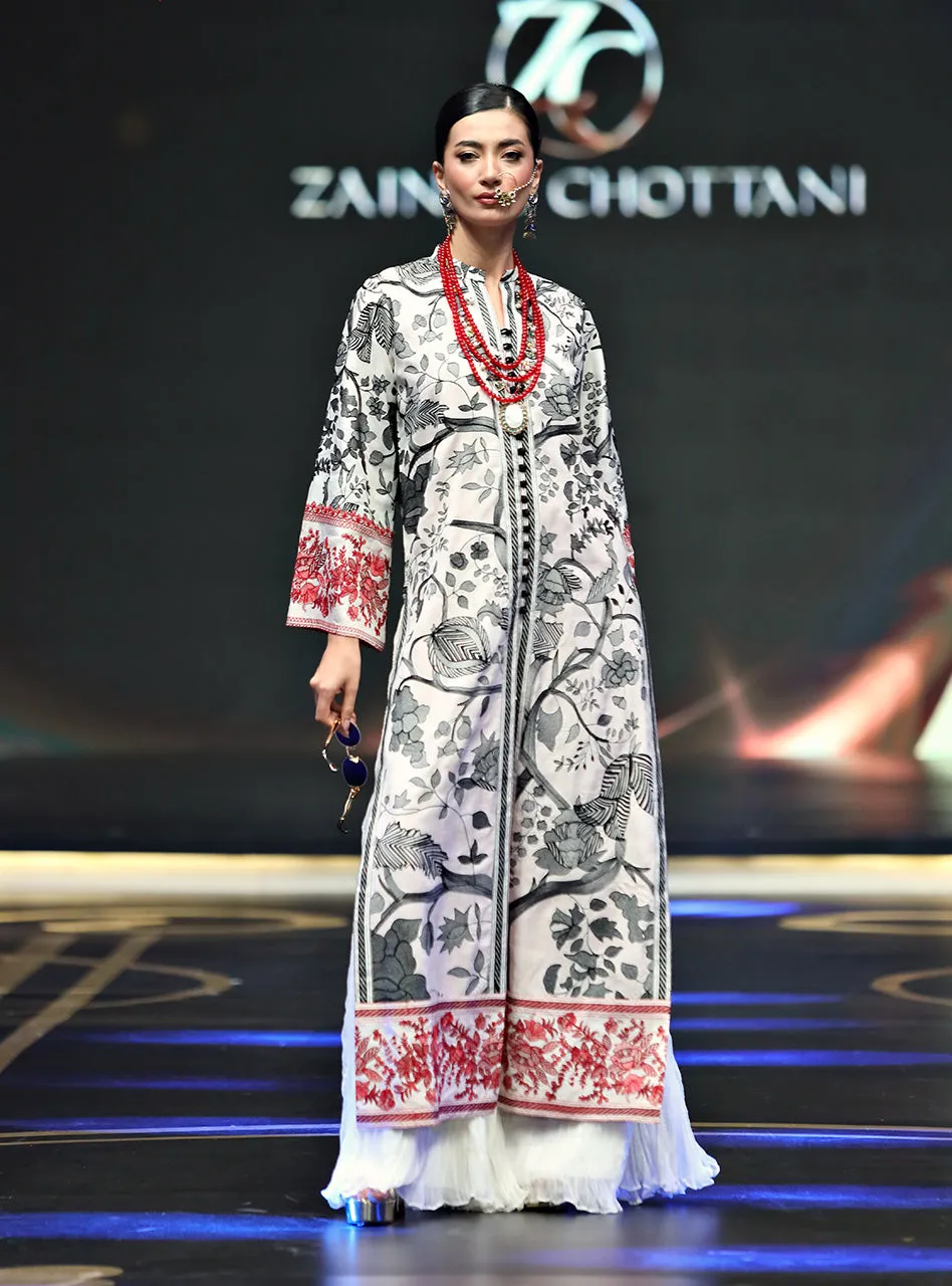 The White Kantha Work Shirt in motion, highlighting the movement and depth of the chiffon crushed culottes.