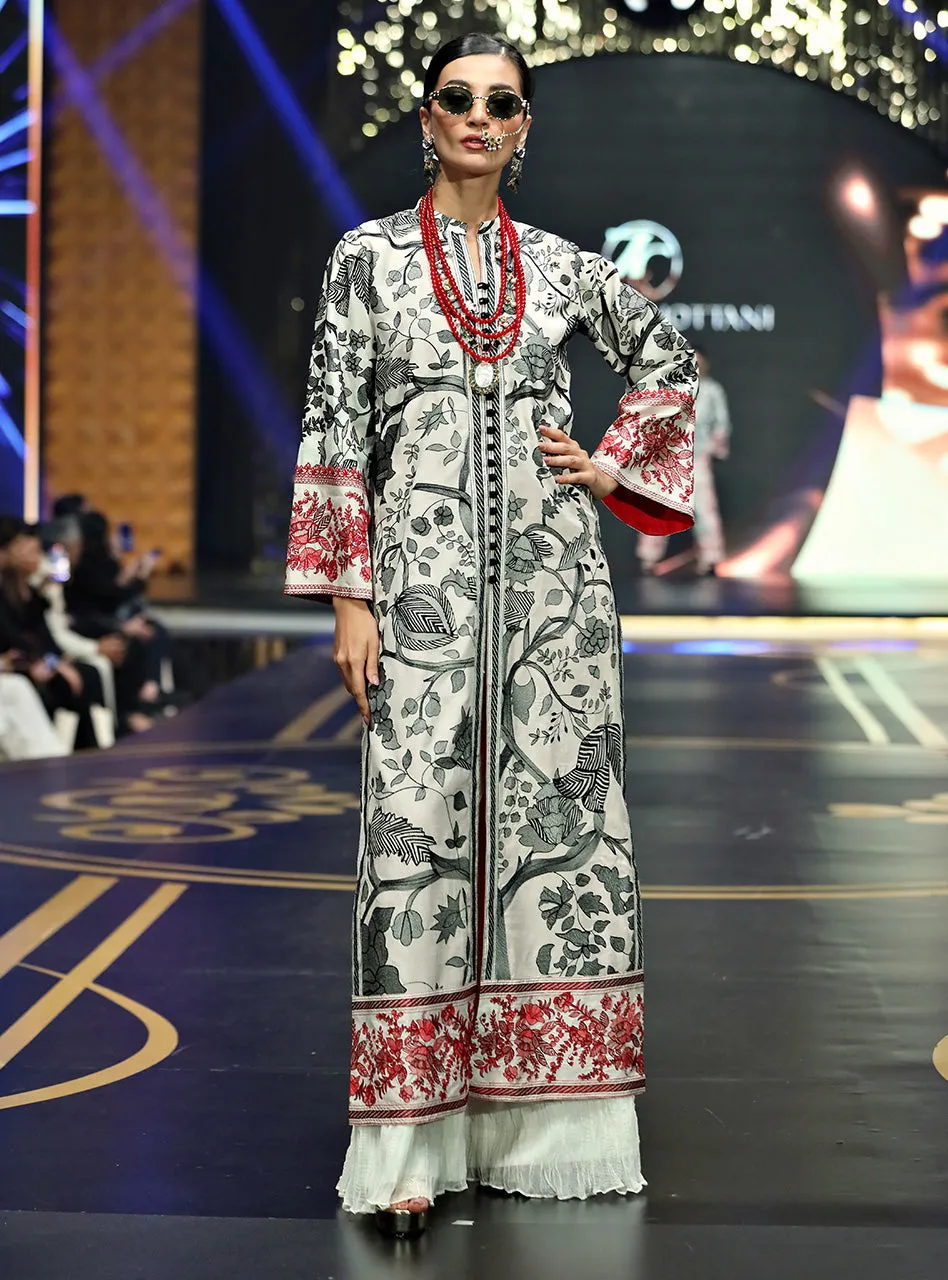 White Kantha Work Shirt showcased as a full ensemble with the free-flowing textured culottes.