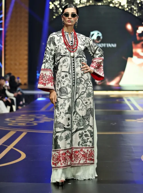 The White Kantha Work Shirt in motion, highlighting the movement and depth of the chiffon crushed culottes. The White Kantha Work Shirt in motion, highlighting the movement and depth of the chiffon crushed culottes.