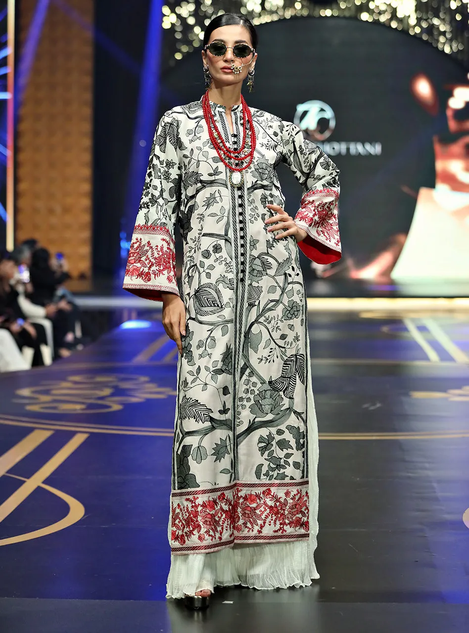 The White Kantha Work Shirt in motion, highlighting the movement and depth of the chiffon crushed culottes.