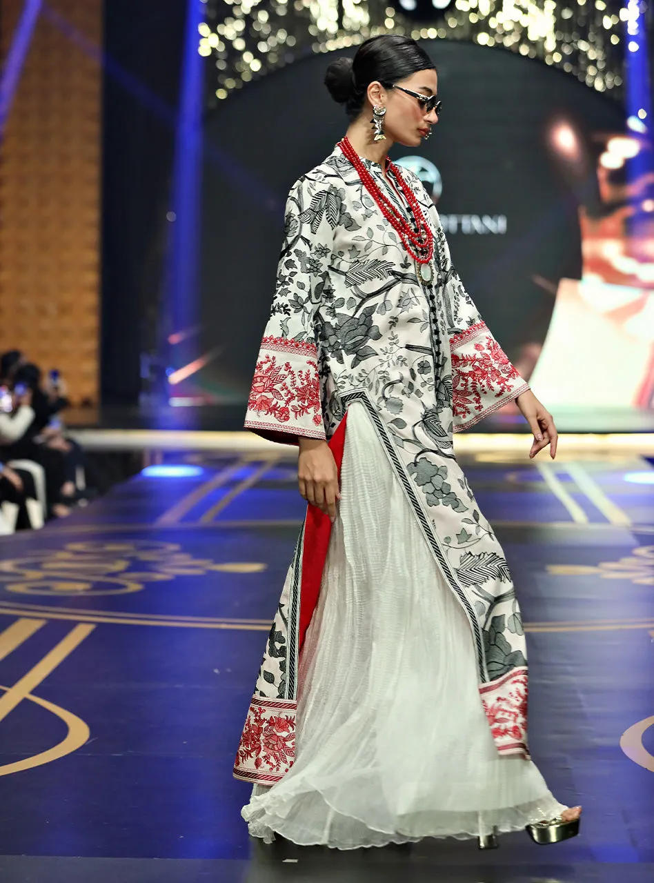 White Kantha Work Shirt showcased as a full ensemble with the free-flowing textured culottes.