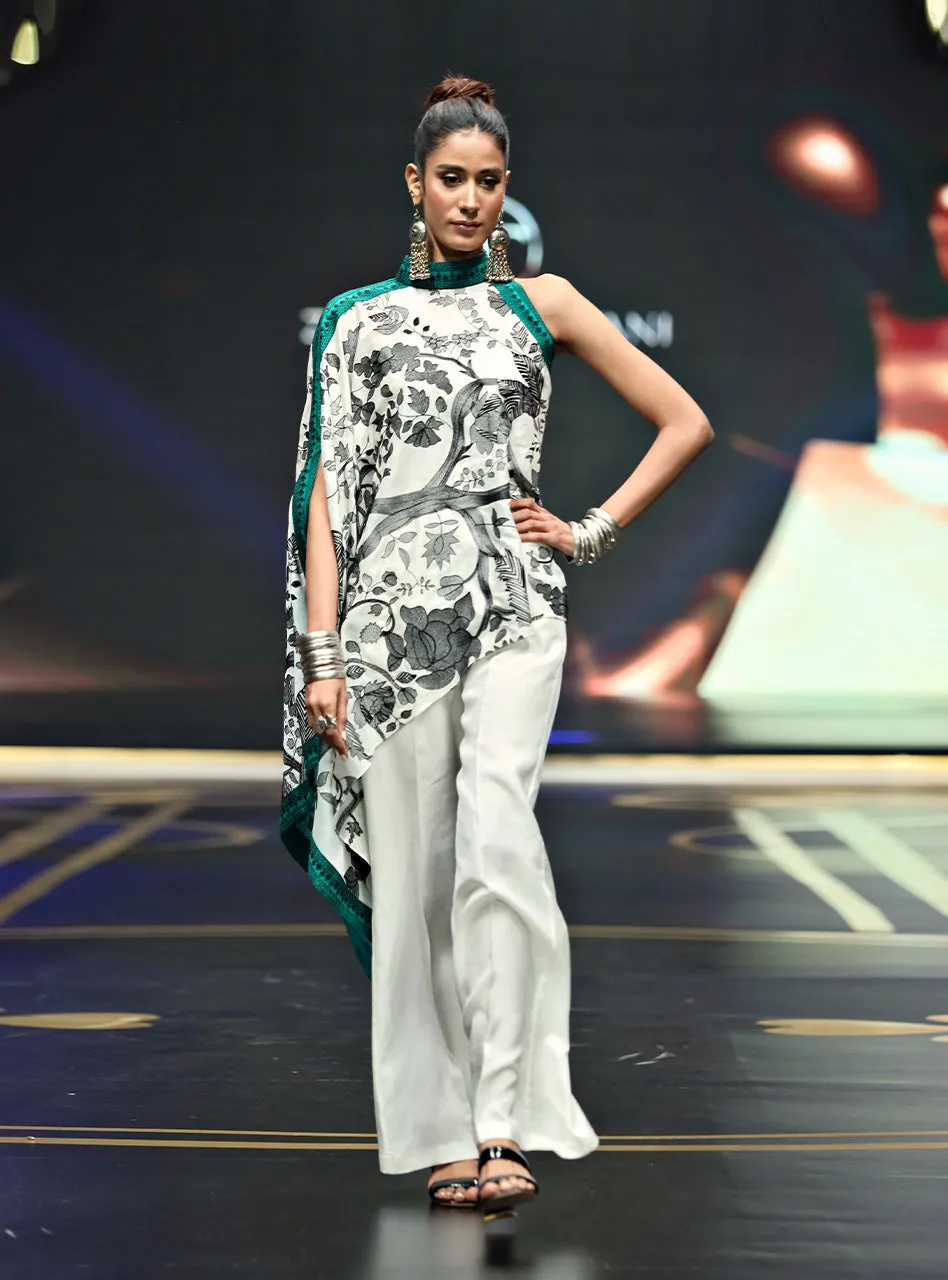 Detail shot of the luxurious, fluid viscose silk fabric of the Kantha Embroidered Outfit.