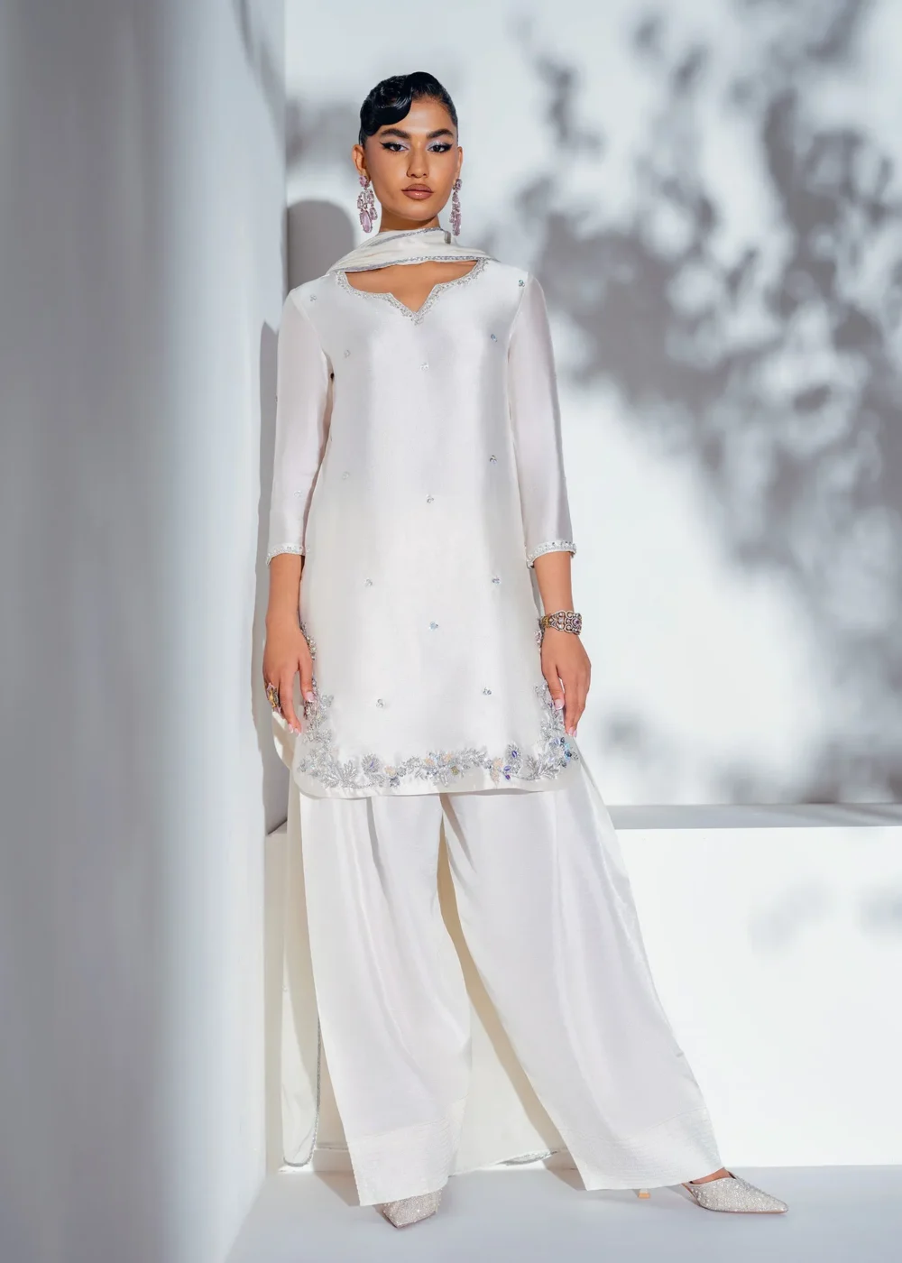 swan white Korean silk shalwar kameez swan white Korean silk shalwar kameez with 3D hand-embellished border, silver floral shalwar, and sequin silk dupatta – Hammad Impressions