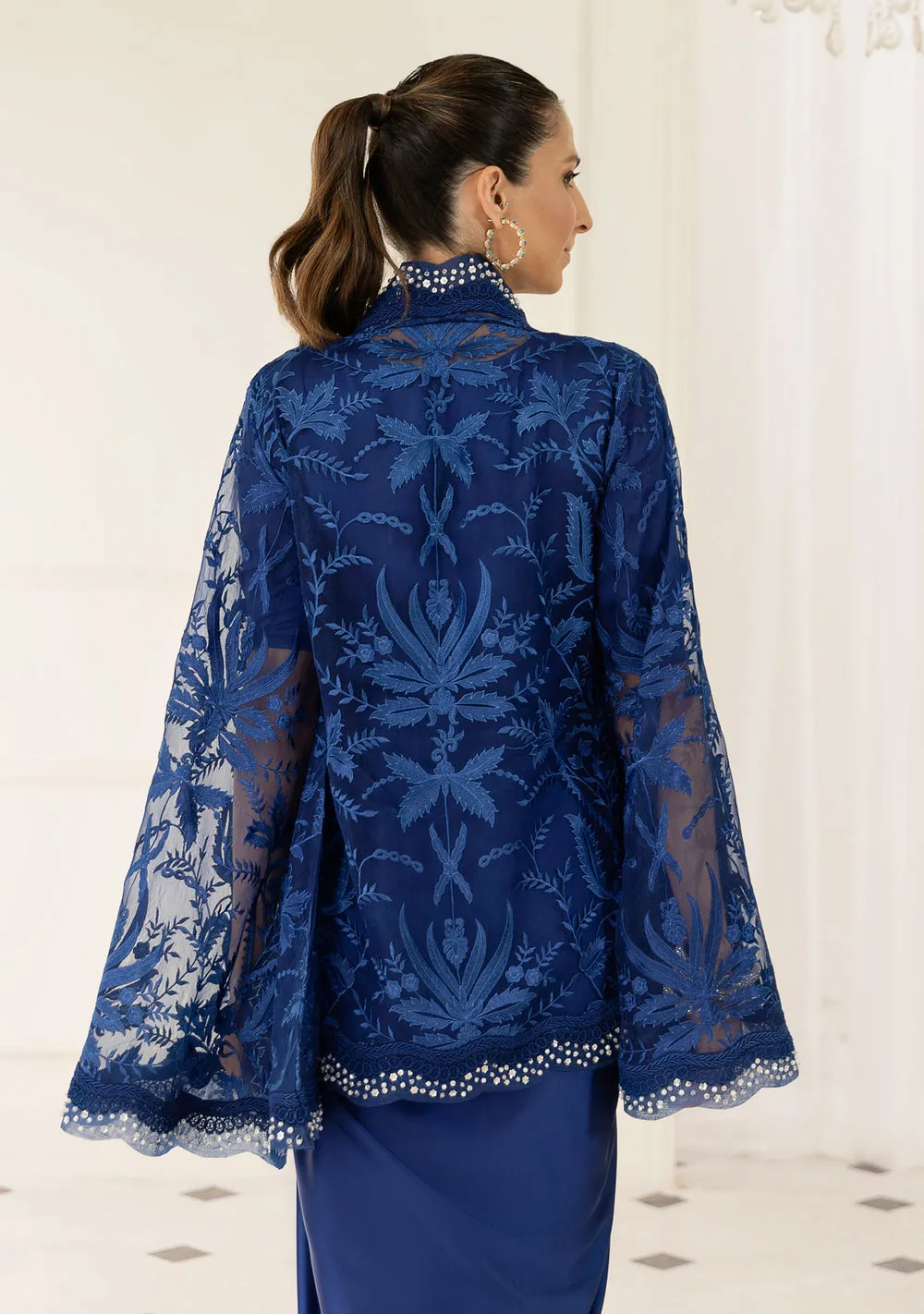 download (13) Eid Royal Blue Organza Cape with intricate embroidery and beaded borders by Hammad Bespoke Official for 2026.