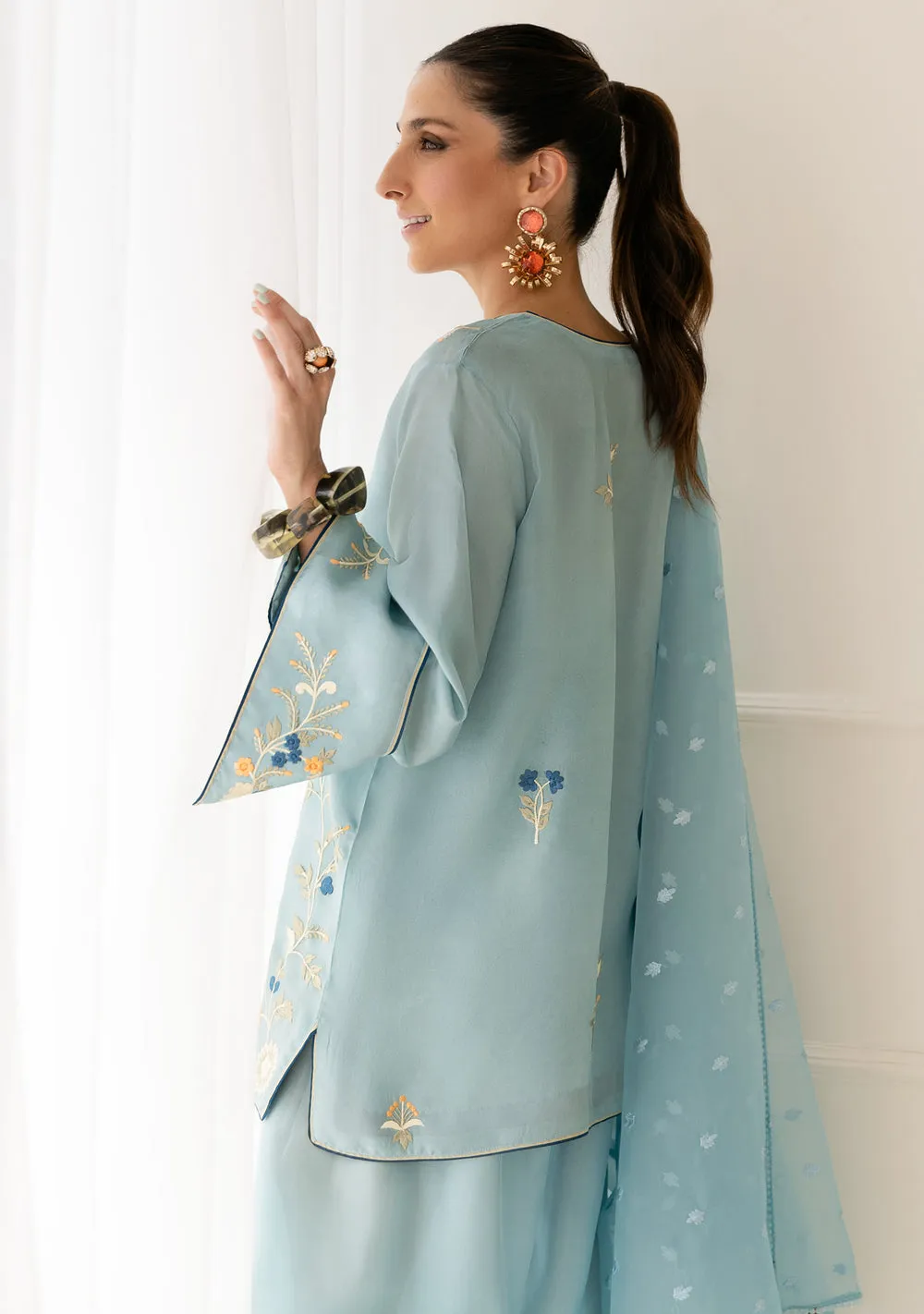 Eid Luxury Silk Kurta in Sky Blue with intricate floral embroidery and oversized fit by Hammad Bespoke Official for Eid 2026.