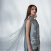 download (27) Close-up of hand-done stone work and crystal detailing on grey raw silk sleeves for luxury Eid 2026 fashion.
