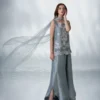 download (29) Model wearing Argenta grey raw silk shirt and elegant slit culottes with heritage craftsmanship for Eid festivities.