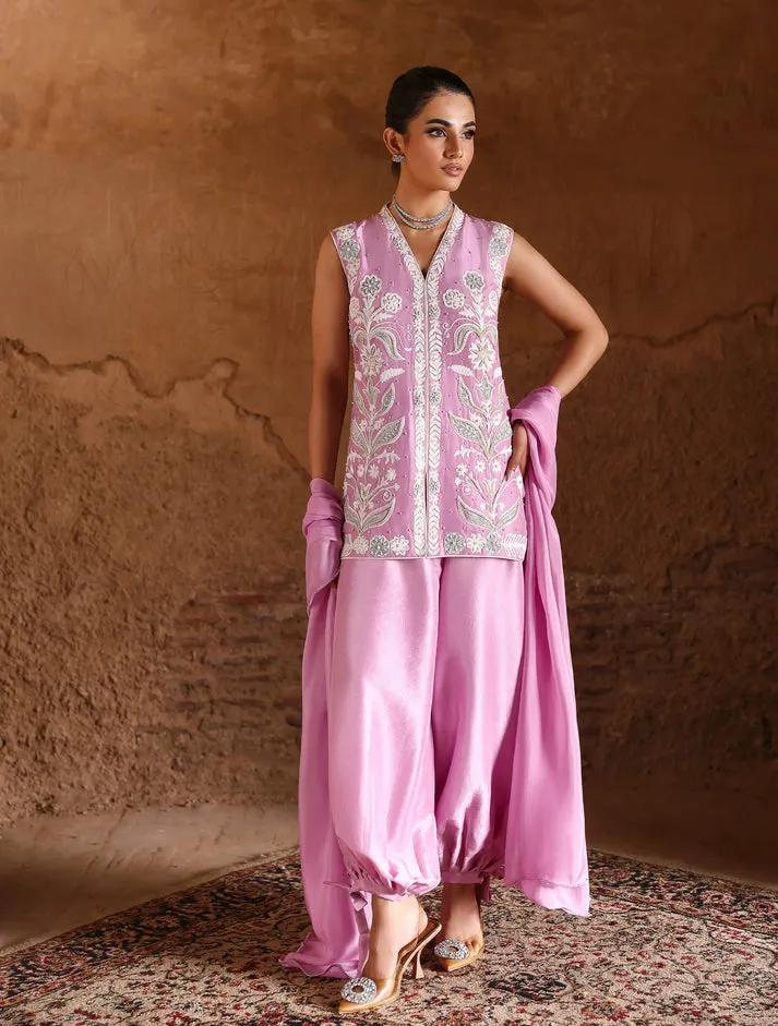 Model in Seraphina white raw silk ensemble showcasing refined artistry and understated luxury for Eid festivities.