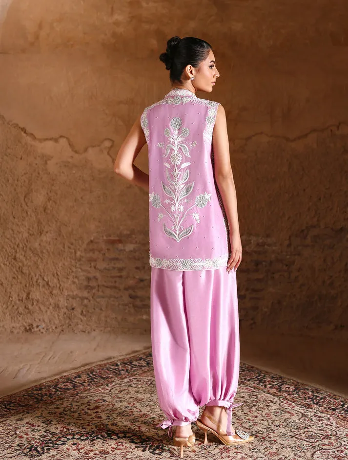 Model in Seraphina white raw silk ensemble showcasing refined artistry and understated luxury for Eid festivities.
