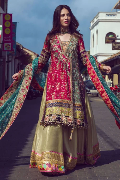 Pakistani mehndi lehenga — crimson Angharka, gold Sharara, teal dupatta, hand-embroidered by HBO Master Artisan
