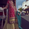 Pakistani mehndi lehenga — crimson Angharka with teal dupatta spread, Kaamdani Resham work, Hammad Bespoke Official