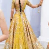 mustard-golden-lehenga-bridal-campaign-full-silhouette-gota-zardozi-hand-embroidered-hammad-bespoke-official.webp golden lehenga bridal open back choli Gota scatter skirt sweep Master Artisan Hammad Bespoke Official