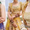mustard-golden-lehenga-bridal-campaign-full-silhouette-gota-zardozi-hand-embroidered-hammad-bespoke-official.webp gold lehenga for bride front bodice Gota Zardozi mustard raw silk choli Hammad Bespoke Official