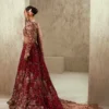 Pakistani maroon velvet bridal lehenga with rose-gold Nakshi dupatta draped — Hammad Bespoke Official Barat couture