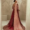 Full-length maroon velvet bridal lehenga with gold Zardozi border and cathedral train — Hammad Bespoke Official