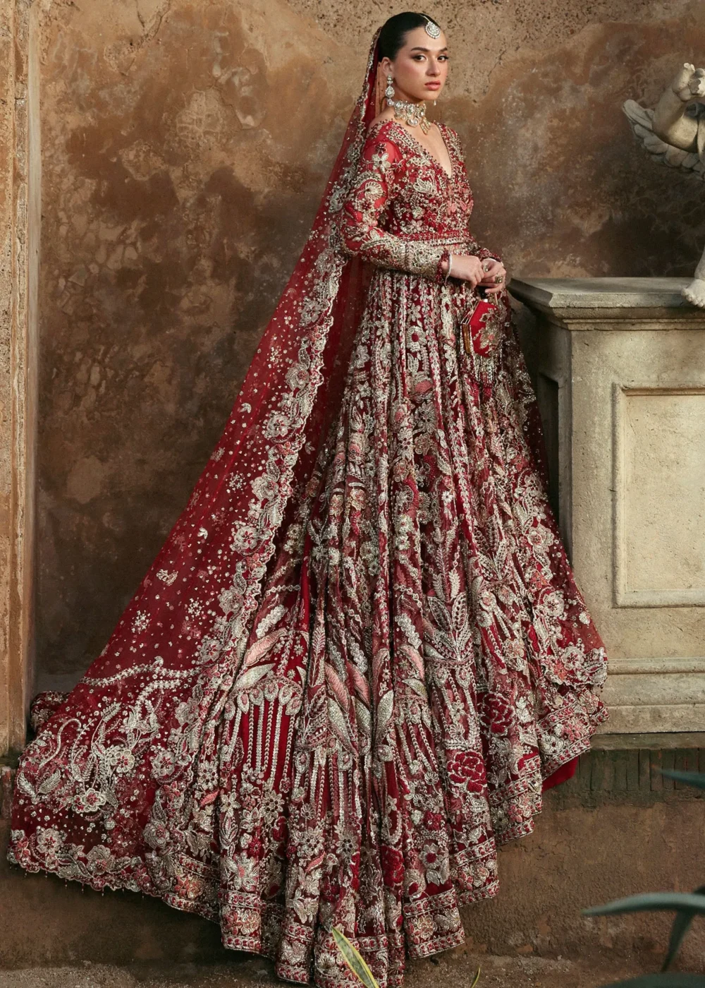 Full-length front three-quarter red net peshwas lehenga with embroidered dupatta — Hammad Bespoke Official Barat couture