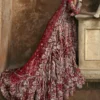 Three-quarter back view deep red net bridal lehenga with full train — Zardozi and Nakshi, Hammad Bespoke Official
