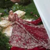 Aerial view red net bridal lehenga train with heavy Zardozi embellishment — Barat couture, Hammad Bespoke Official