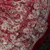 Close-up gold Zardozi and Nakshi floral embroidery on deep red net bridal lehenga — Master Artisan work, Hammad Bespoke Official