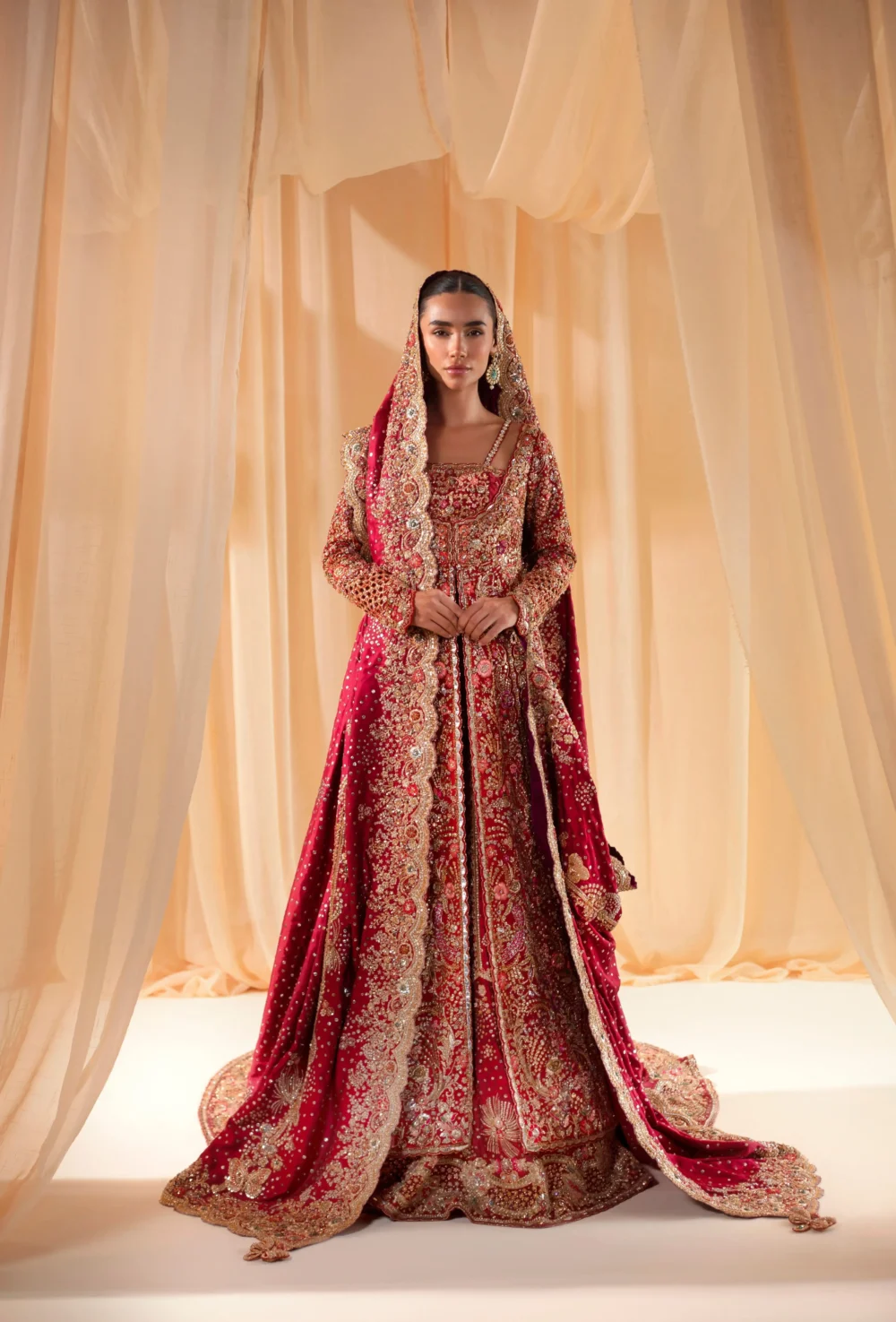 red bridal lehenga Pakistani Full-length angrakha style with cathedral train and gold Nakshi dupatta — HBO Atelier
