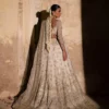 ivory-lehenga-back-view-open-back-choli-zari-net-dupatta-nikkah-bridal-hammad-bespoke-official.webp Sahn Lumis