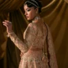 blush pink lehenga bridal back view Master Artisan embroidery pearl tassels Hammad Bespoke Official