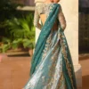 teal-lehenga-cathedral-train-tissue-skirt-cutwork-back-walima-atelier-hammad-bespoke-official.webp teal lehenga cathedral train tissue skirt cutwork back walima atelier Hammad Bespoke Official