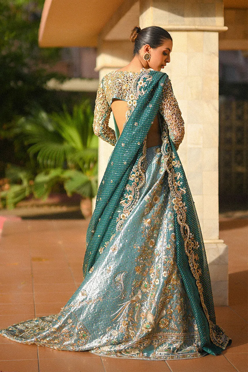 teal-lehenga-cathedral-train-tissue-skirt-cutwork-back-walima-atelier-hammad-bespoke-official.webp teal lehenga cathedral train tissue skirt cutwork back walima atelier Hammad Bespoke Official