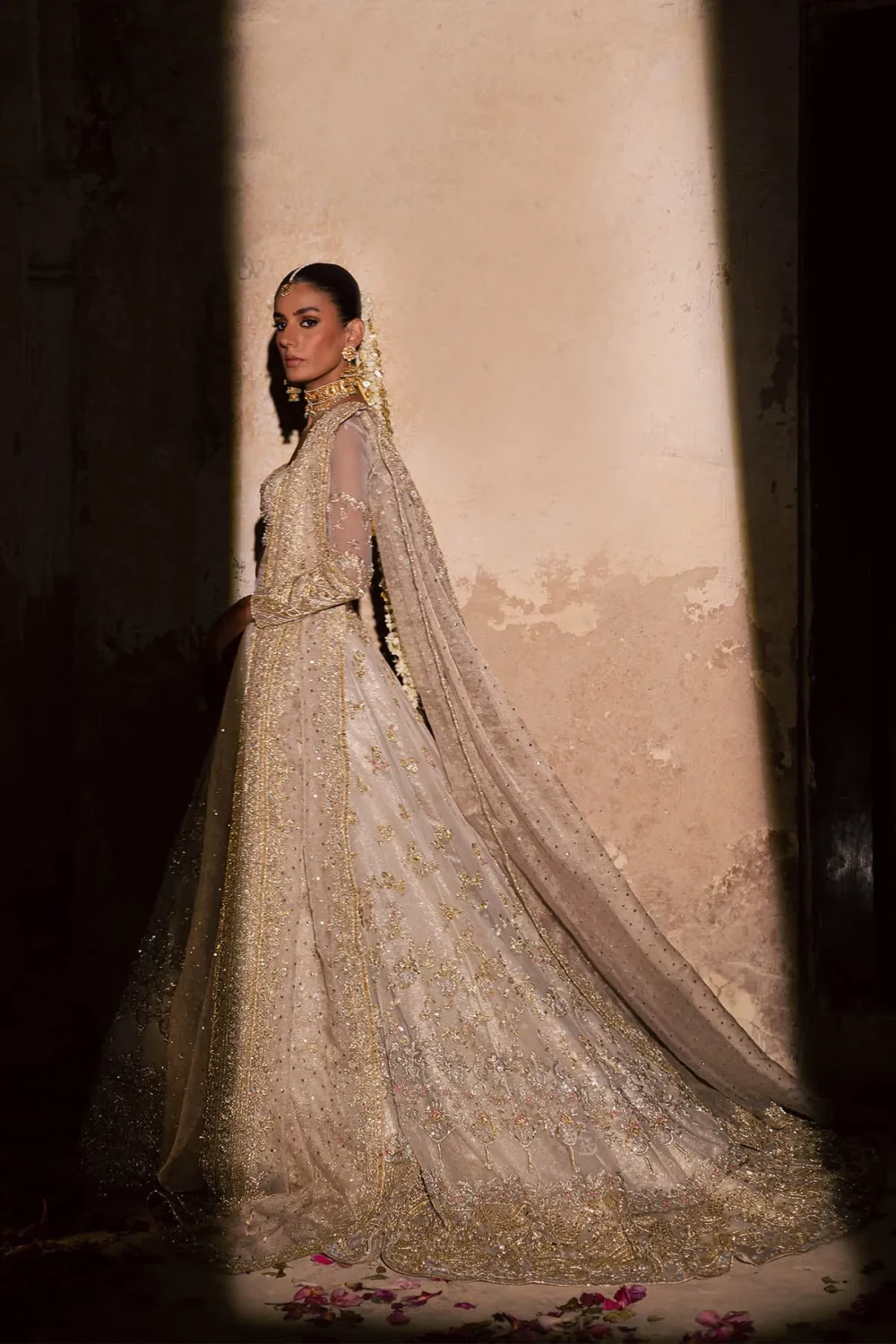 ivory-lehenga-side-view-zardozi-gotta-organza-nikkah-bridal-hammad-bespoke-official.webp ivory lehenga side view Zardozi Gotta organza nikkah bridal Hammad Bespoke Official
