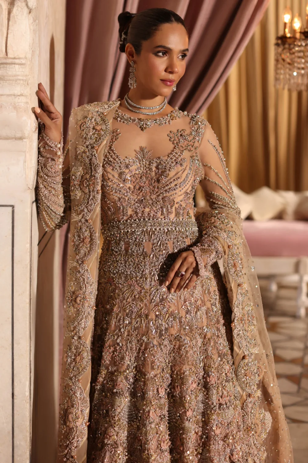 peach-lehenga-bodice-close-up-zardozi-resham-crystal-bead-embellishment-master-artisan-hammad-bespoke-official.webp peach lehenga bodice close-up Zardozi Resham crystal bead embellishment Master Artisan Hammad Bespoke Official