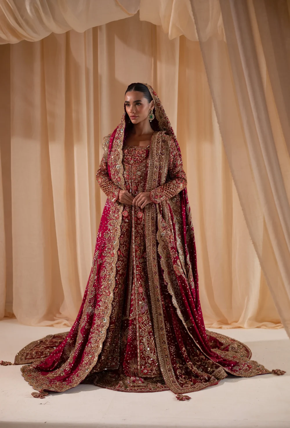 Dark red bridal lehenga Pakistani angrakha overlay with heavy Tilla border and mirror work — HBO Multan Atelier