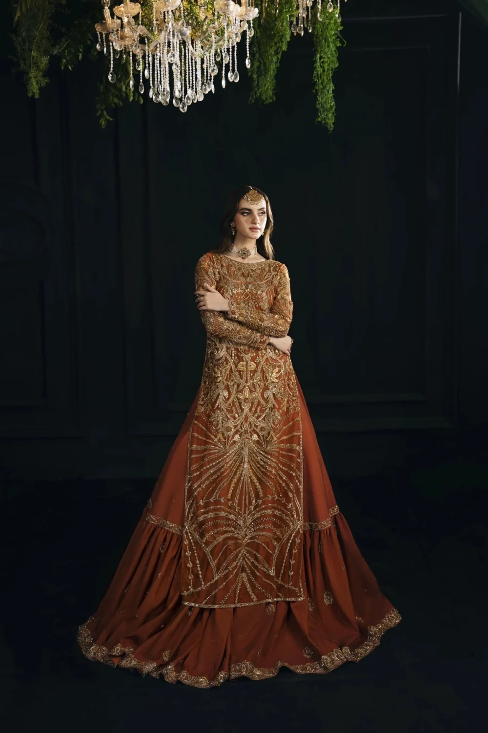 Burnt orange bridal lehenga — farshi silhouette with gold Nakshi embroidery, bespoke Multan Atelier, Hammad Bespoke Official