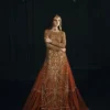 Burnt orange bridal lehenga — farshi silhouette with gold Nakshi embroidery, bespoke Multan Atelier, Hammad Bespoke Official