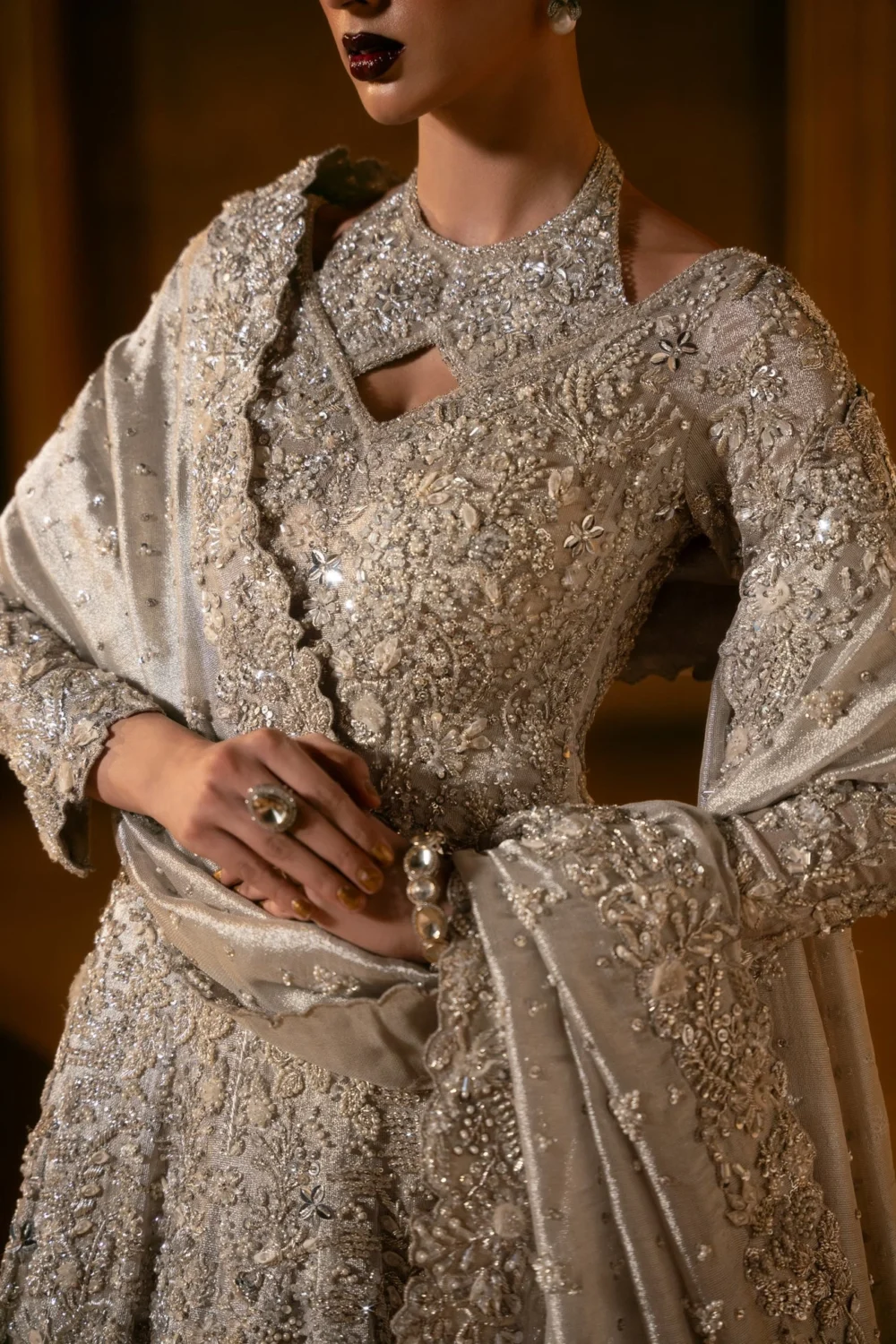 white-nikkah-dress-crosswrap-neckline-close-up-resham-embroidery-hammad-bespoke-official.webp white nikkah dress crosswrap neckline close-up Resham embroidery Hammad Bespoke Official