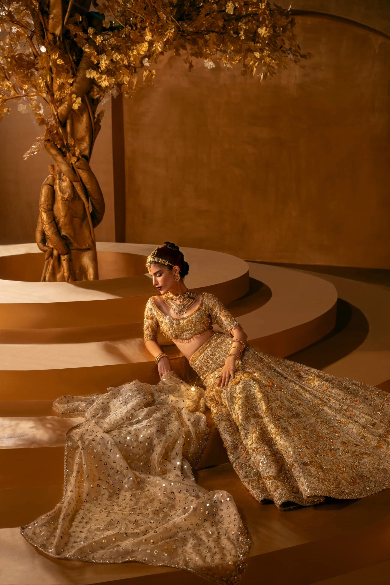 Pakistani suits — bridal lehenga in gold embroidery by Hammad Bespoke Official